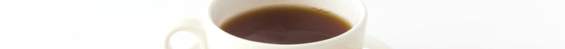 black tea in a white mug